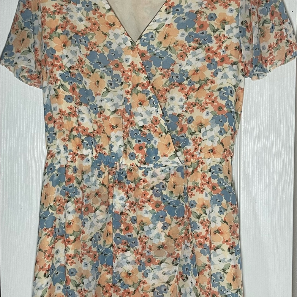 PrettyGarden dress with blue and peach flowers on white background